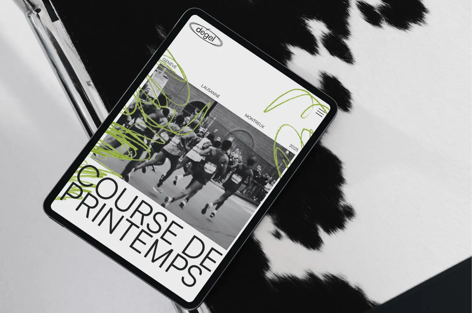 tablet landing page web design for a running marathon with minimalist typography and editorial layout